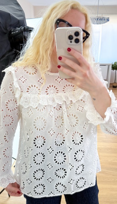 White frilled blouse