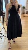 Black midi pleated skirt